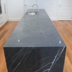 Pietra Grigio Marble Island Bench coated with Clearstone
