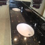 Black marble vanity basin coated with Clearstone